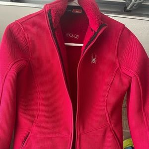 Spyder size Small. A few tiny snags on pocket area. Only worn several times